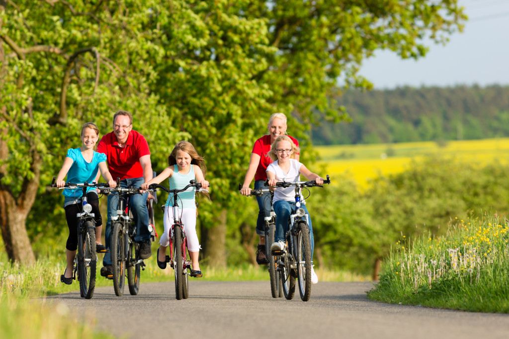 family on a bike ride outdoors